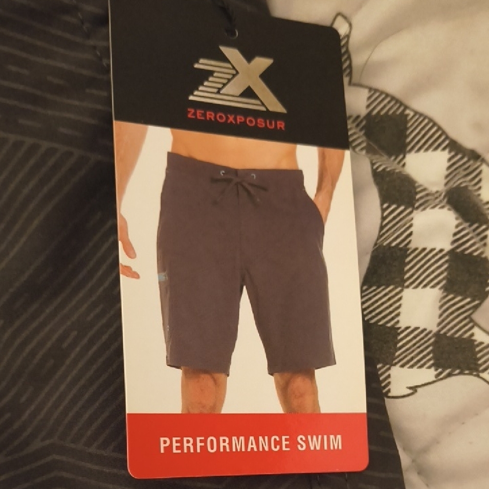 ZeroXposur Black and Teal Board Shorts - Picture 2 of 3